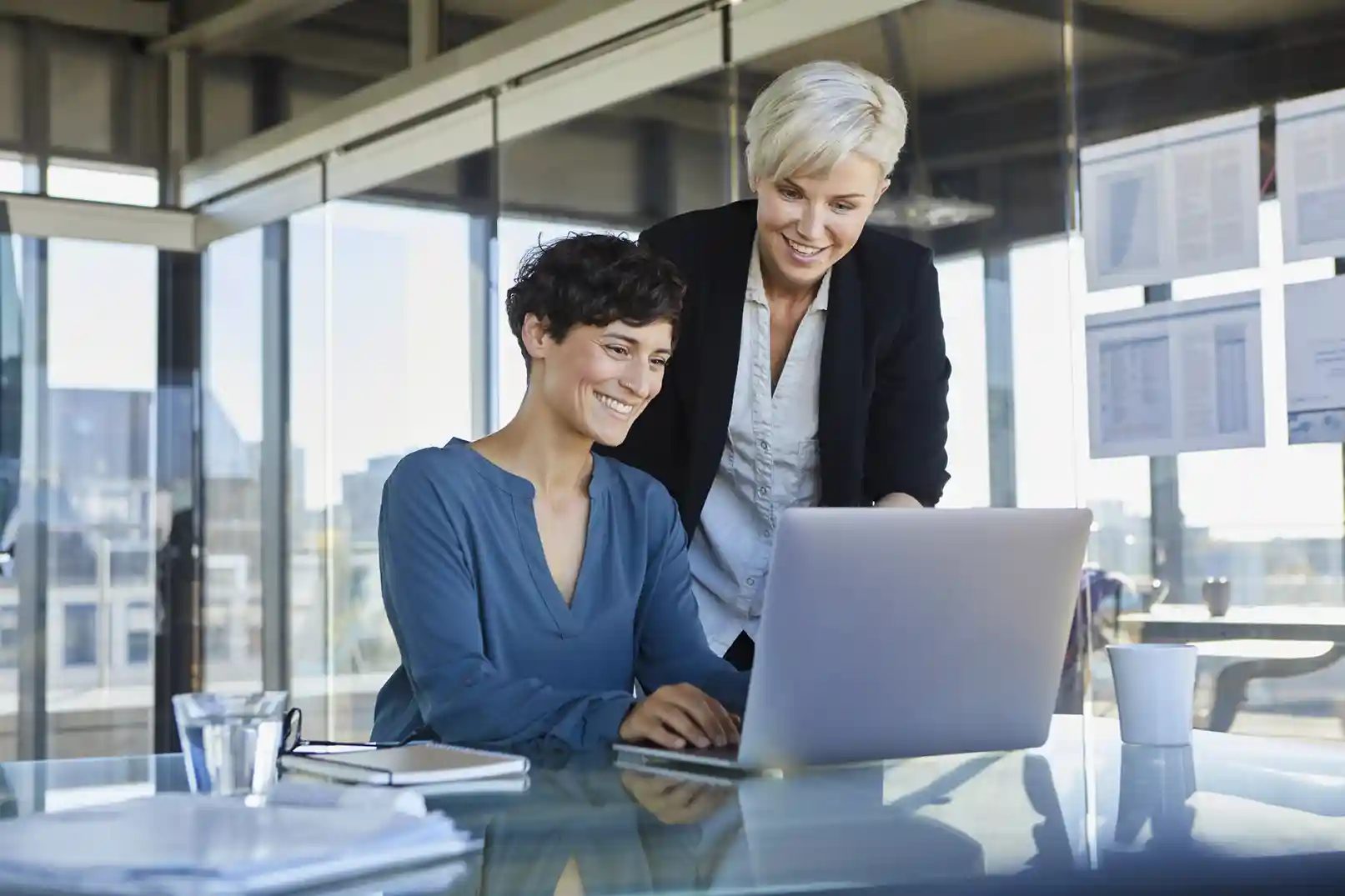 two-smiling-businesswomen